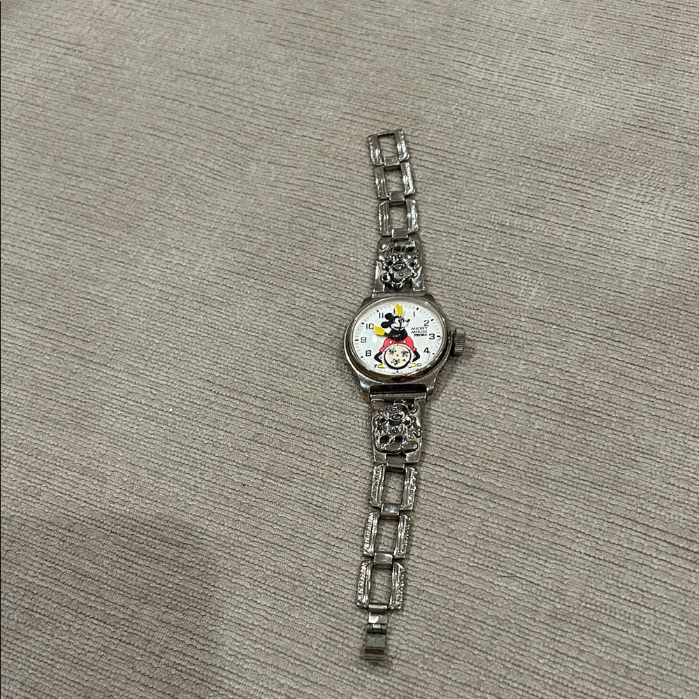 Vintage Disney Mickey Mouse Silver Watch with Red and Yellow Accents